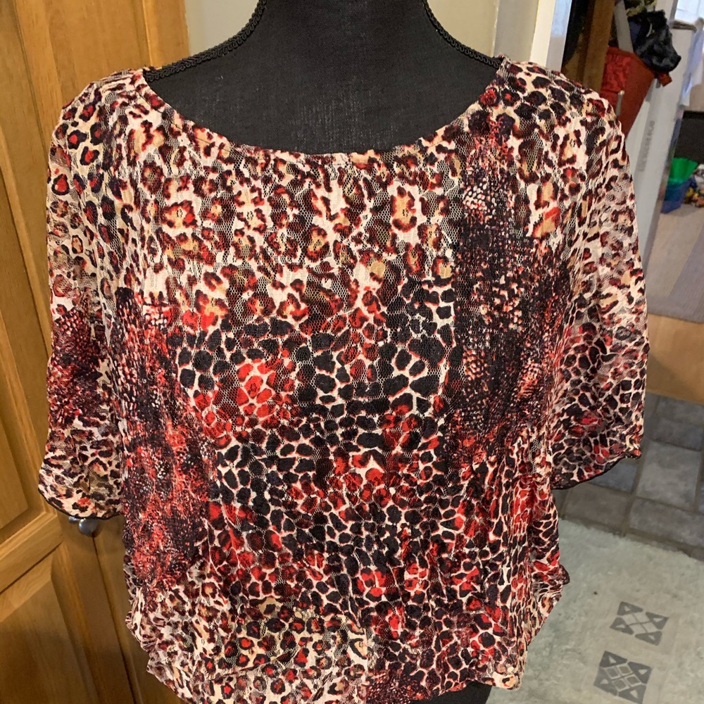 Fun top has black attached shell